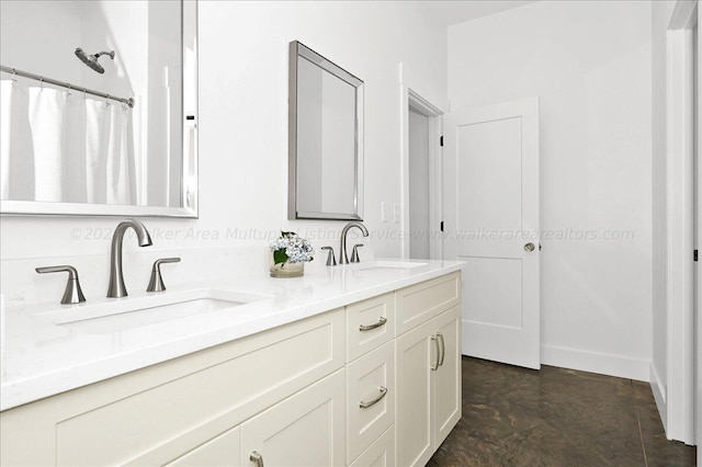 bathroom with vanity and concrete floors