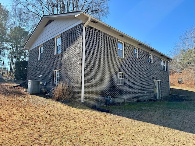 view of side of property featuring cooling unit