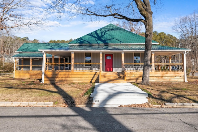 farmhouse-style home with covered porch