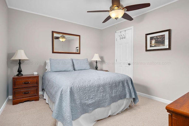 bedroom with ceiling fan and ornamental molding