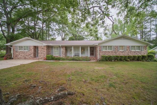 ranch-style home with a front yard