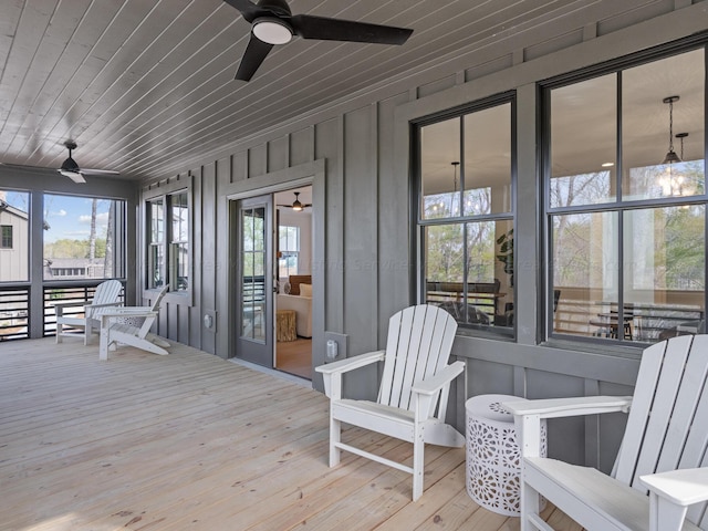 wooden deck with ceiling fan