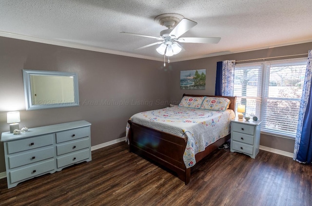 bedroom with a textured ceiling, baseboards, wood finished floors, and crown molding