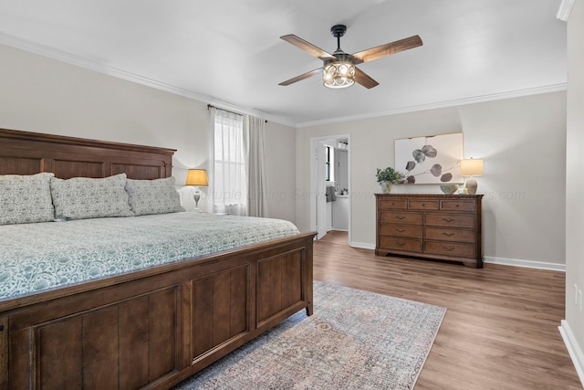 bedroom with crown molding, light wood-style flooring, baseboards, and ceiling fan