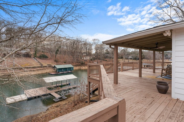 deck featuring a floating dock and a water view