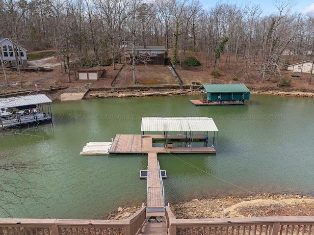 view of dock featuring a water view and boat lift