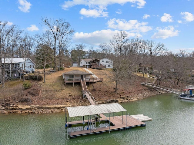 dock area with a water view