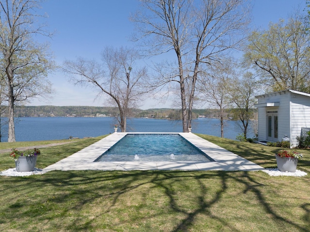 view of yard featuring french doors and a water view