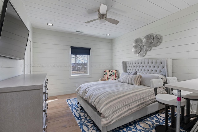 bedroom with recessed lighting, wood finished floors, visible vents, and a ceiling fan