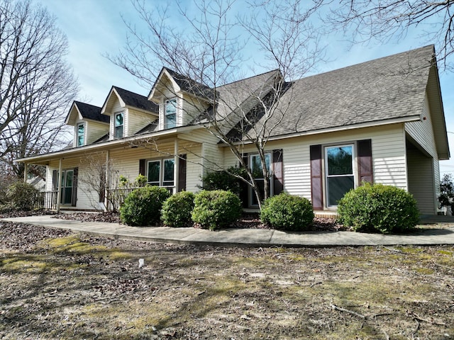 cape cod house with covered porch