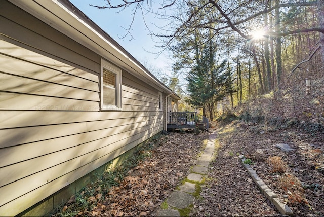 view of home's exterior with a deck