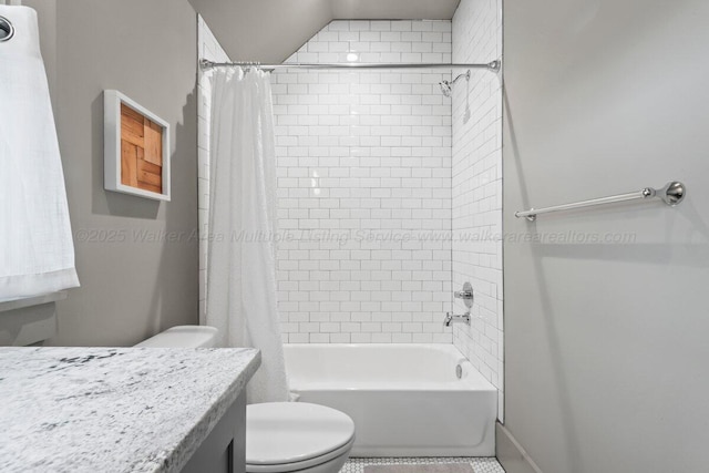 full bathroom featuring shower / bathtub combination with curtain, vanity, and toilet