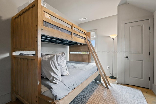 bedroom with light wood-type flooring