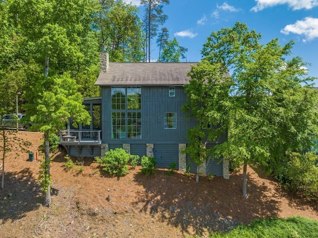 view of property exterior featuring a deck