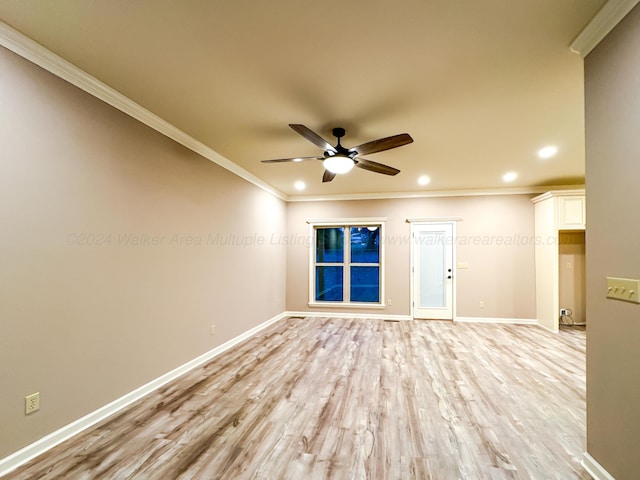 unfurnished room with ceiling fan, light hardwood / wood-style flooring, and ornamental molding