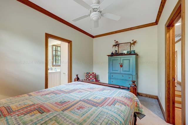 carpeted bedroom with crown molding, connected bathroom, and ceiling fan