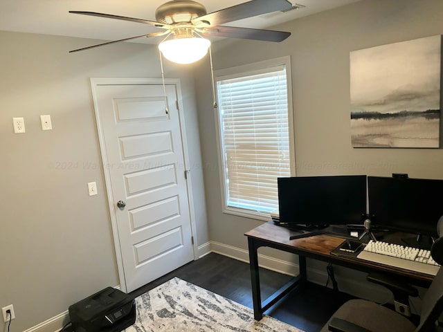 office space featuring dark hardwood / wood-style floors and ceiling fan