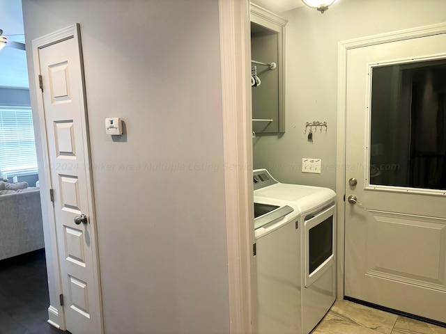 laundry room with washer and clothes dryer