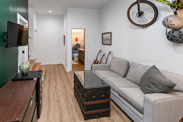 living room with light hardwood / wood-style flooring