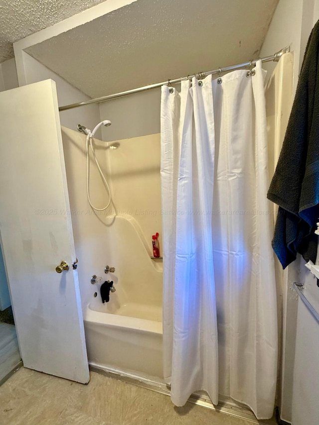 bathroom featuring shower / tub combo with curtain