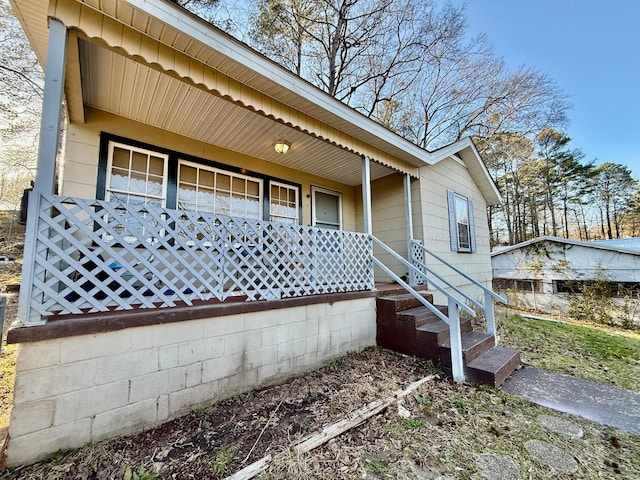 view of home's exterior with covered porch