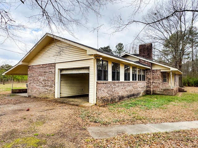 view of property exterior with a garage