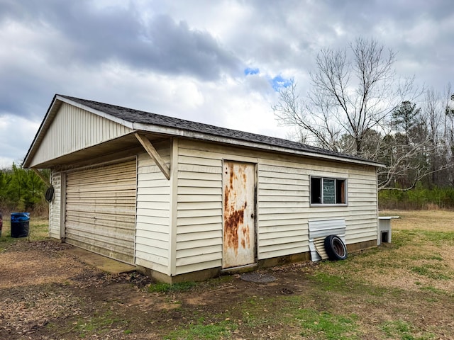 view of outdoor structure with a garage