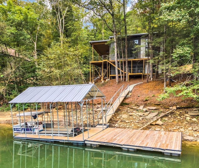 view of dock with a water view