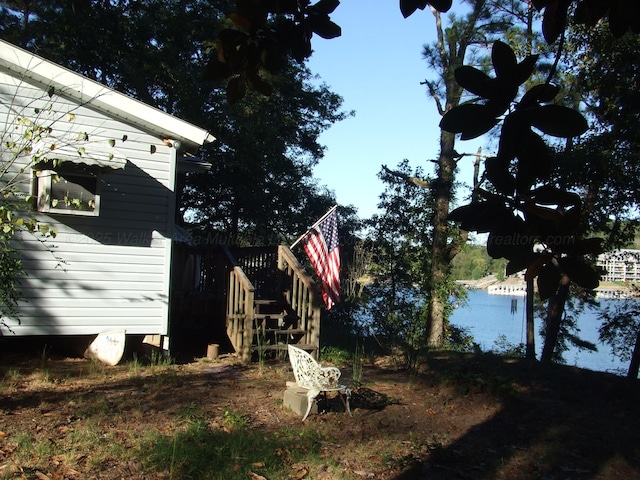 view of home's exterior featuring stairway