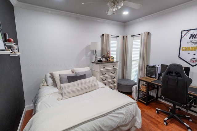 bedroom featuring ceiling fan, wood-type flooring, and ornamental molding