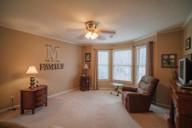 living area with crown molding, light carpet, ceiling fan, and a textured ceiling