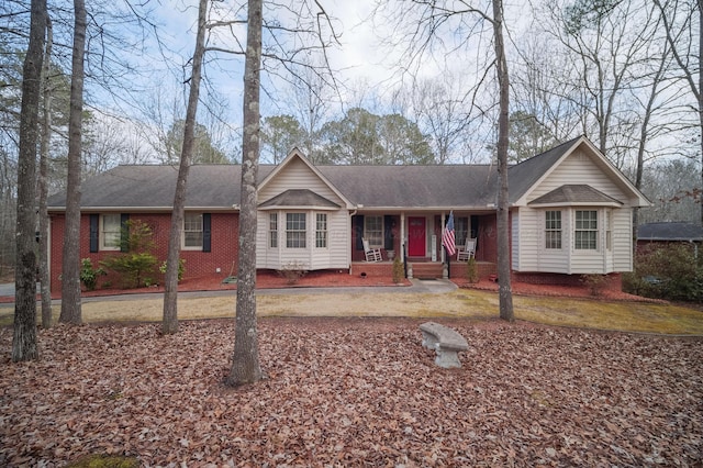 ranch-style house with covered porch