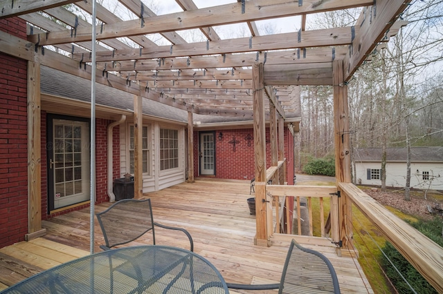 wooden terrace with a pergola