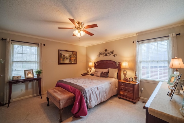 carpeted bedroom featuring crown molding, ceiling fan, and a textured ceiling