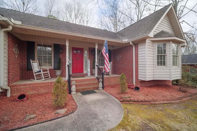 ranch-style home featuring covered porch