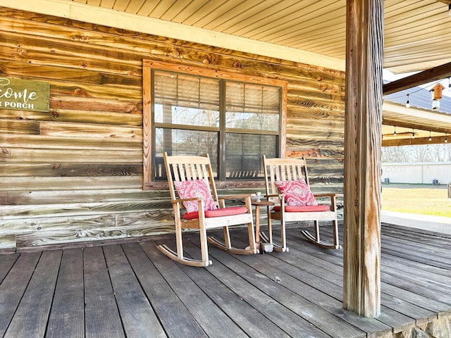 wooden deck featuring a porch