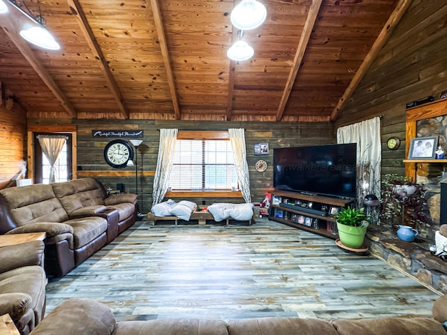 unfurnished living room with wooden ceiling, beamed ceiling, high vaulted ceiling, hardwood / wood-style floors, and wooden walls