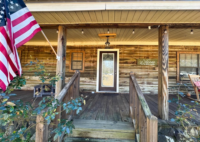 entrance to property with a porch