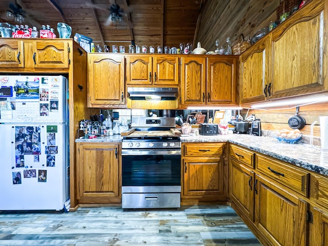 kitchen with wooden ceiling, stainless steel stove, light hardwood / wood-style flooring, white fridge, and light stone counters