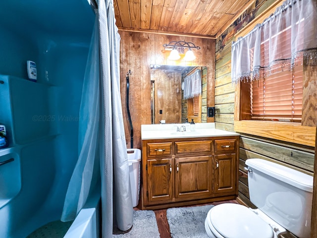 full bathroom with shower / tub combo, wood ceiling, vanity, wooden walls, and toilet