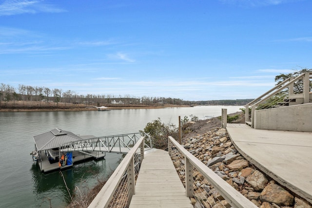 dock area with a water view