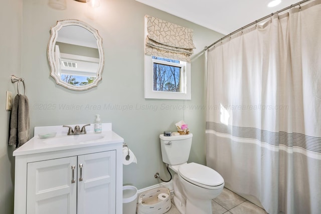 bathroom with tile patterned flooring, vanity, toilet, and a shower with shower curtain