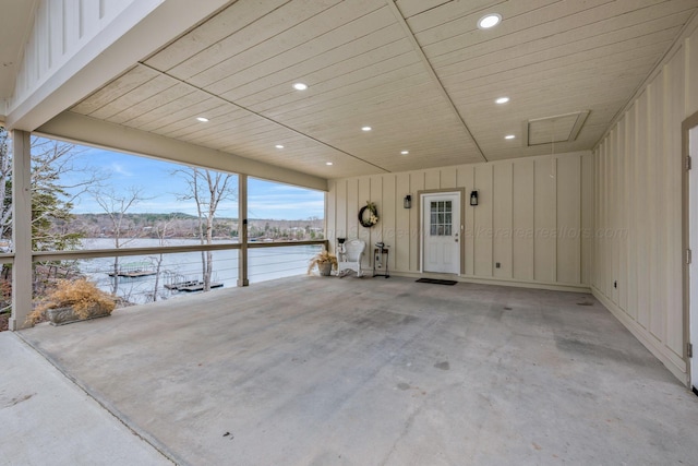 view of patio featuring a water view