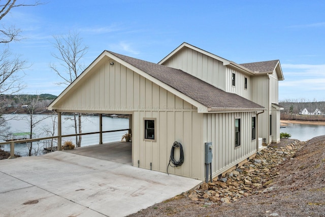 exterior space with a water view