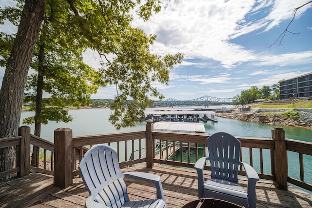 deck featuring a water view