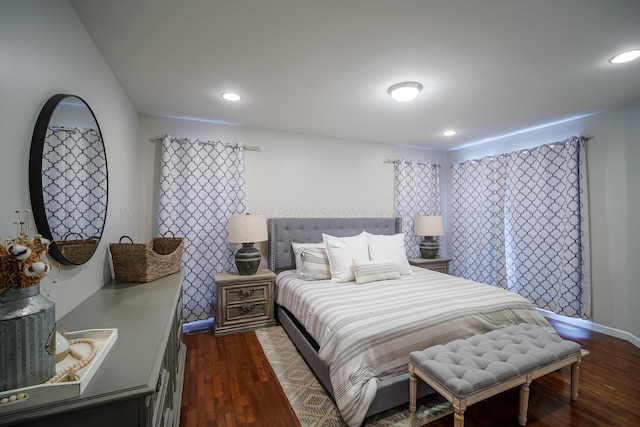 bedroom featuring dark hardwood / wood-style flooring