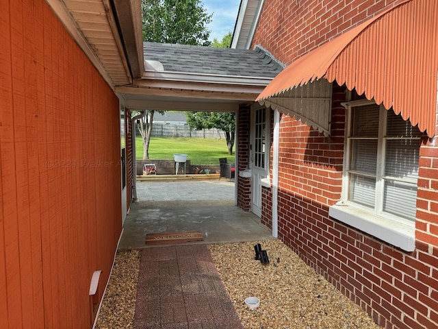 view of property exterior with a patio