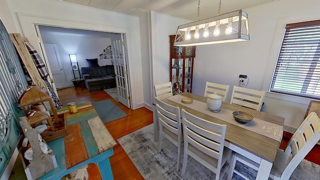 dining room with dark hardwood / wood-style flooring