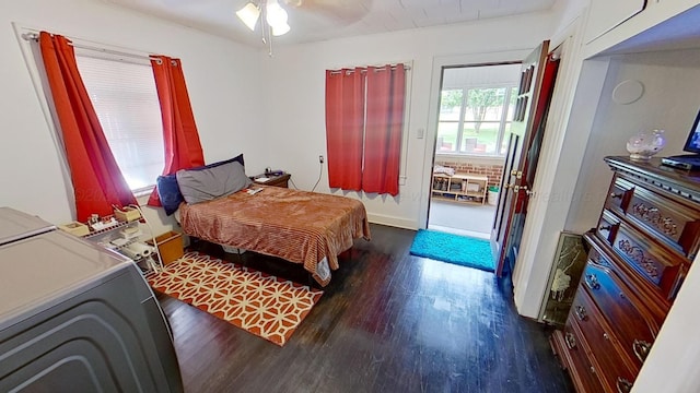 bedroom featuring ceiling fan and dark wood-type flooring