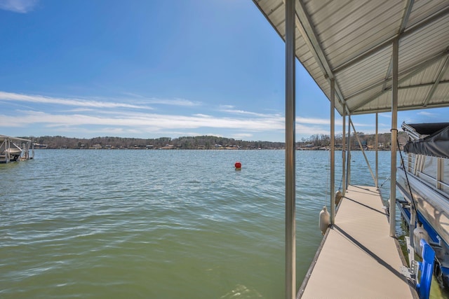 view of dock with a water view